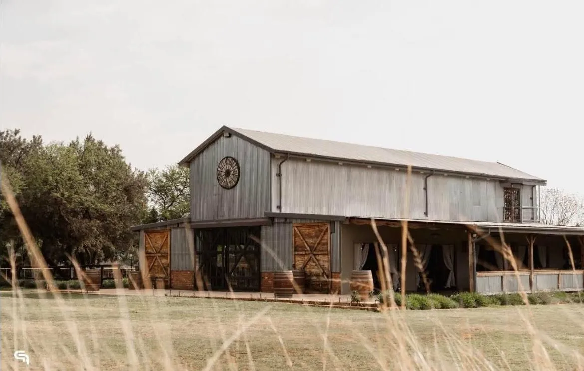 Wedding flowers and decor at Stable View venue by Hada Events — in-house florist